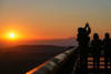 Tourists take photos of the sunrise at the Dongji Pavilion, Fuyuan, Heilongjiang.