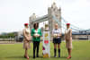 Rugby union referee, Hollie Davidson (right), and former rugby union player, Maggie Alphonsi (left), pictured with Emirates Cabin Crew in London as Emirates signs on as Official Partner of the Women's Rugby World Cup 2025