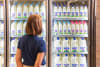 Consumer looking at a2 milk product range