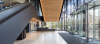 Minimalist Crystal Tourniket revolving doors harmonise with Arbor's spacious, airy entrance.