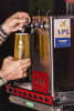 Pouring beer, or a cool gin and tonic, straight from the back of the RV regularly makes Pat and his crew the envy of remote campsites around Australia.