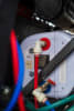 The Aus J Duoetto MK2 10L 12V/240V water heater is neatly integrated into Pat's F-150 build.