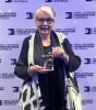 CAROL HANLON RECEIVING AWARD