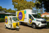 Electric tuk-tuk and van from ANC's EV fleet.