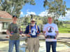 Brendan, John and Geoff with drinks holders for two-legged and four-legged visitors in front of the Dog on the Tucker Box and kiosk, which opens in time for the school holidays.