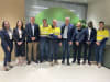 IBO_extension1.jpeg: Fortescue, Director of Iron Bridge Operations, Graham Howard (fifth from left) and Thiess Group Executive Australia West, David Greig (fourth from right) shake hands following Thiess' successful contract extension at Iron Bridge
