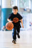 Youth playing basketball