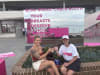 Breast cancer survivor Karley Spicer shares a cup of tea with a BCNA counsellor at the Bondi Breast Check Booth.