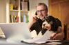 Dog and owner working from home
