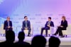 Christopher Hui, Hong Kong's Secretary for Financial Services and the Treasury (left), Eric Jing, Chairman of Ant Group (second from left), and Fred Hu, Founder, Chairman and CEO of Primavera Capital Group (second from right), speak at a panel titled "Curating the New FinTech Era".