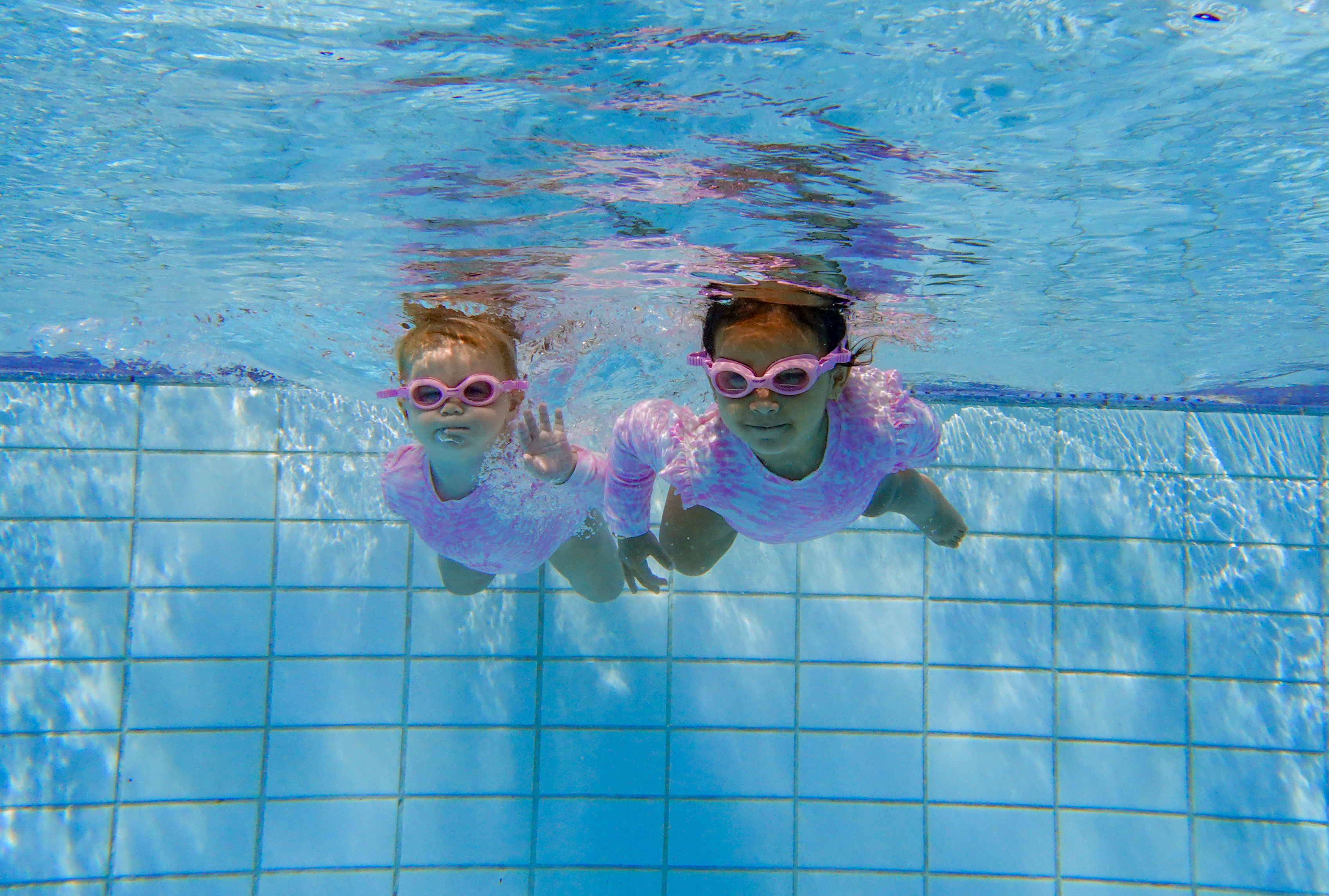 Lulu  Lawrence 2 and Laia 3 are getting confident in the water since both started lessons from 3 months old. 